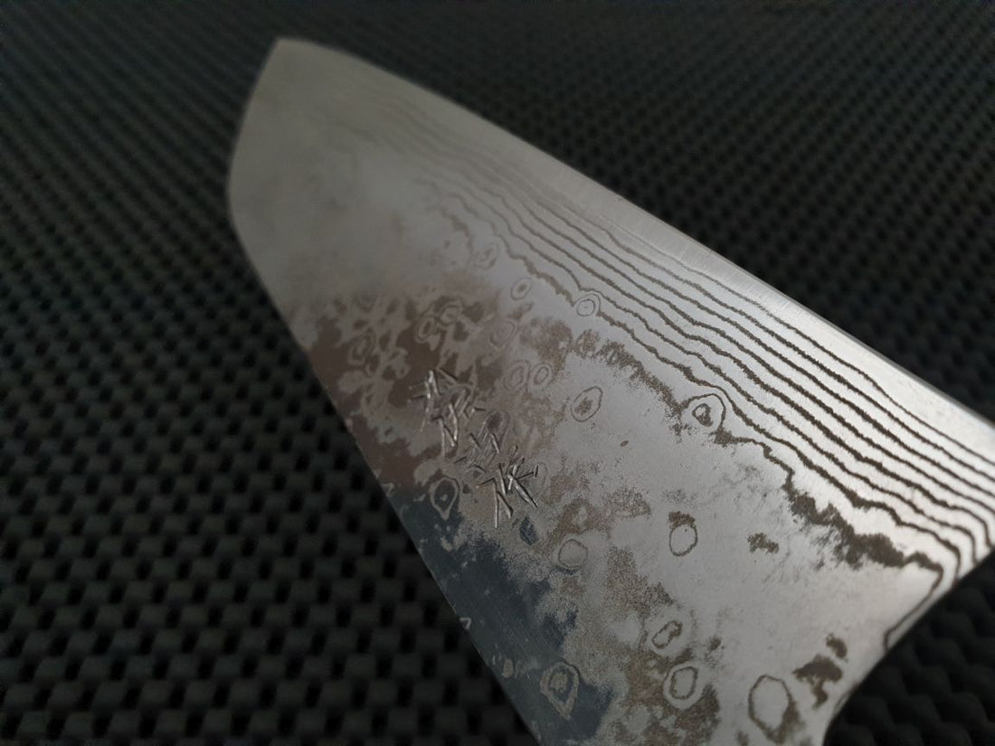 Yoshida ZDP Damascus Santoku Knife