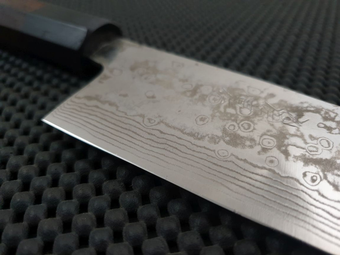 Yoshida ZDP Damascus Santoku Knife