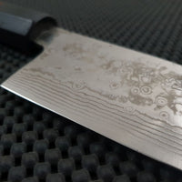 Yoshida ZDP Damascus Santoku Knife